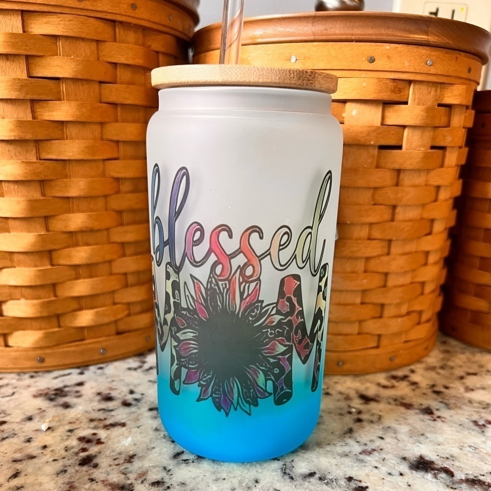 16 oz glass drinking glass with bamboo lid and straw.